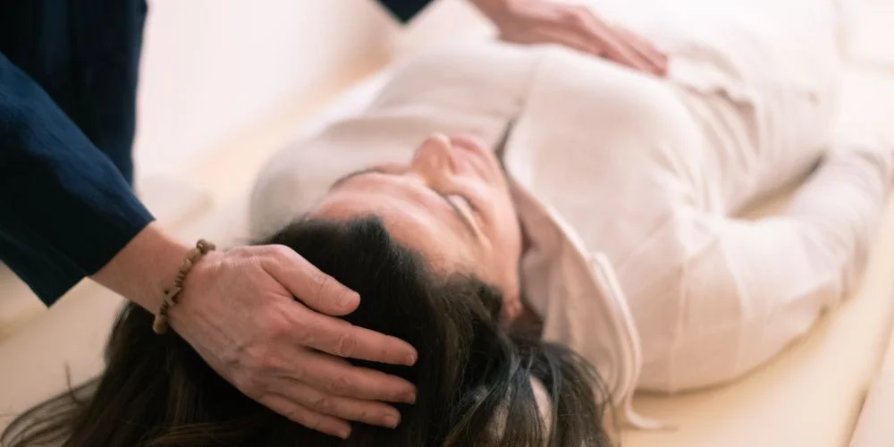 Someone experiencing Reiki